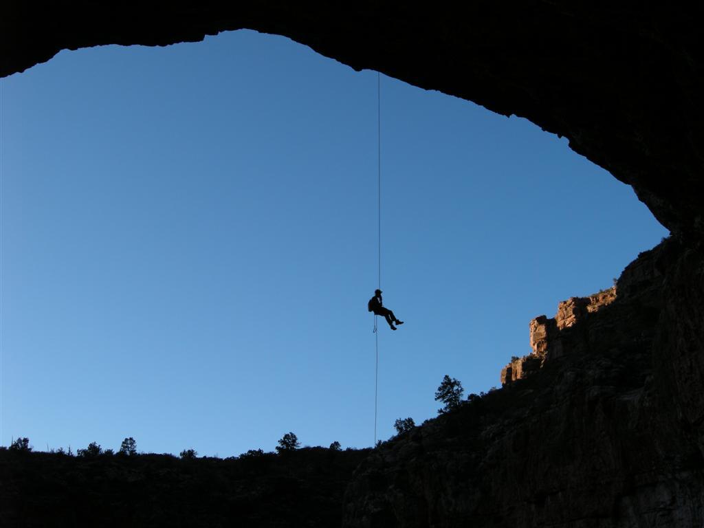 Rappeling into entrance of Double Bopper.  Photo by Shawn Thomas.